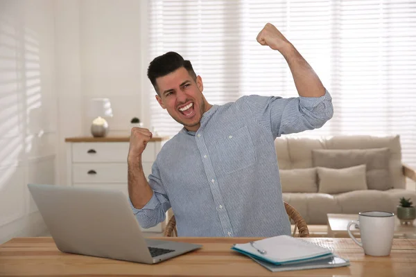 Emotional Man Participating Online Auction Using Laptop Home — Stock Photo, Image