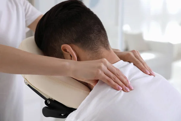 Man Receiving Massage Modern Chair Indoors Closeup — Stock Photo, Image