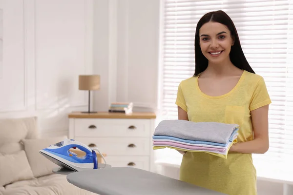 Woman Folded Clothes Ironing Board Home Space Text — Stock Photo, Image