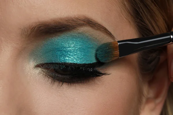 Applying Cyan Eye Shadow Woman Face Closeup Beautiful Evening Makeup Stock Picture