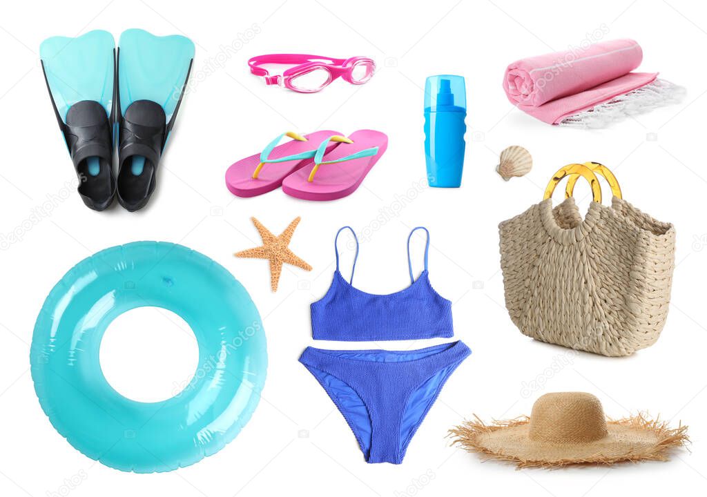 Set with different beach accessories on white background 