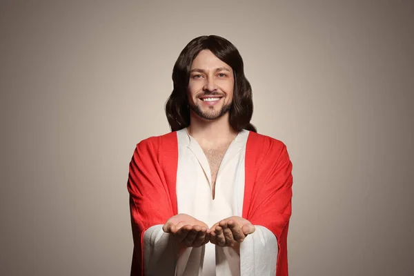 Jesus Cristo Estendendo Mãos Sobre Fundo Bege — Fotografia de Stock