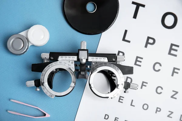 Different Ophthalmologist Tools Light Blue Background Flat Lay — Stock Photo, Image