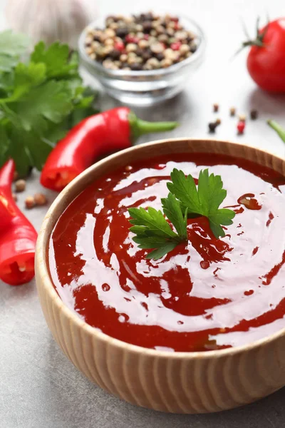 Spicy Chili Sauce Parsley Wooden Bowl Light Grey Table — Stock Photo, Image