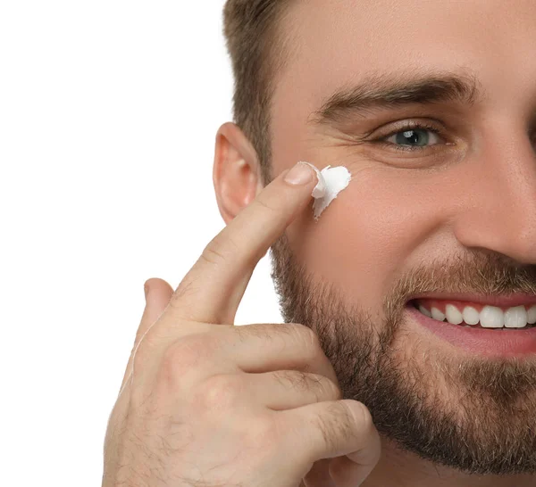 Happy Young Man Applying Facial Cream White Background Closeup — 图库照片