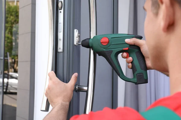 Handyman Screw Gun Repairing Door Lock Outdoors Closeup — 스톡 사진