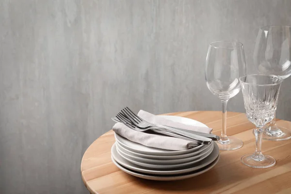 Set Clean Dishware Glasses Cutlery Wooden Table Space Text — ストック写真