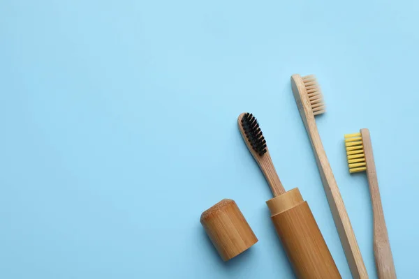 Bamboo Toothbrushes Light Blue Background Flat Lay Space Text — Stock Photo, Image