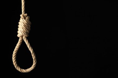 Siyah arkaplanda düğüm olan ip düğümü, metin için boşluk
