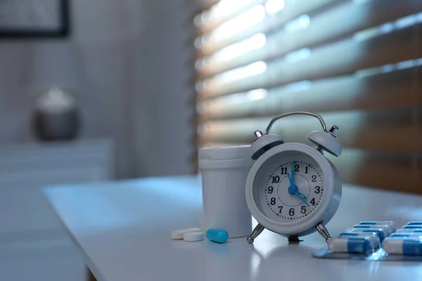 Alarm Clock Pills White Table Indoors Space Text Insomnia Treatment — Stock Photo, Image