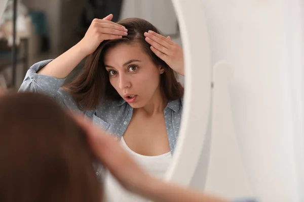 Emotional Woman Hair Loss Problem Looking Mirror Indoors — Stock Photo, Image