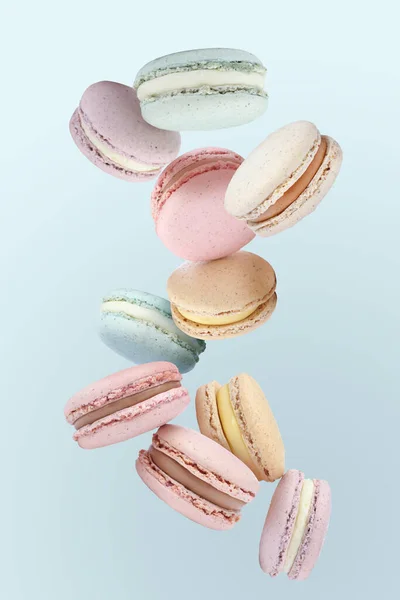 Doux Délicieux Macarons Volant Sur Fond Bleu Clair — Photo