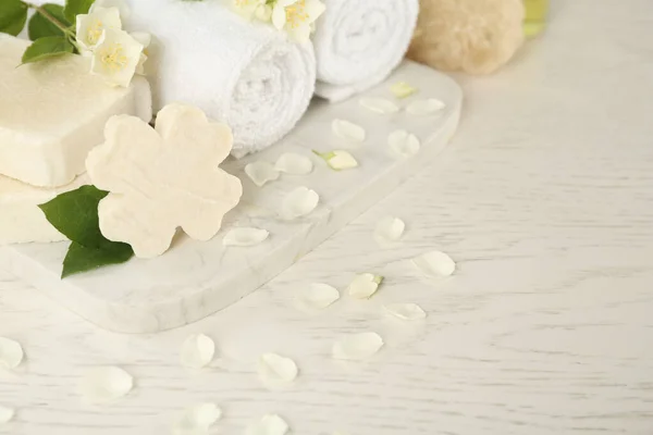Beautiful Jasmine Flowers Towels Soap Bars White Wooden Table — Stock Photo, Image