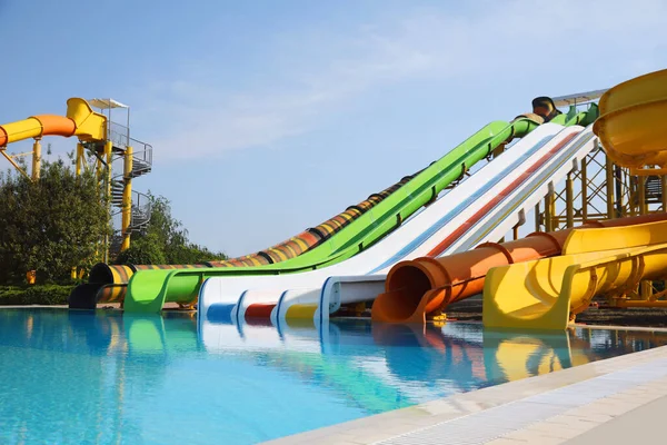 Beautiful View Water Park Colorful Slides Swimming Pool Sunny Day — Stock Photo, Image
