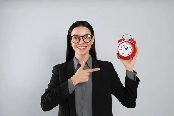 Businesswoman Holding Alarm Clock Light Grey Background Time Management — Stock Photo, Image