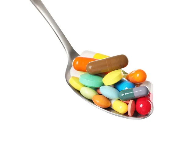 Diverse Pillole Colorate Cucchiaio Isolato Bianco — Foto Stock