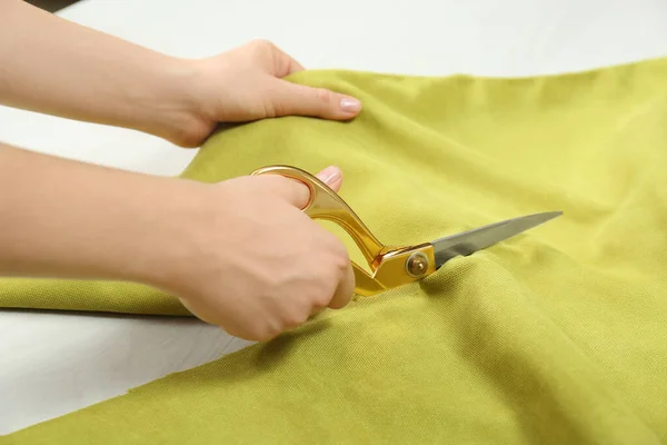 Seamstress Cutting Light Green Fabric Scissors Workplace Closeup — Stock Photo, Image