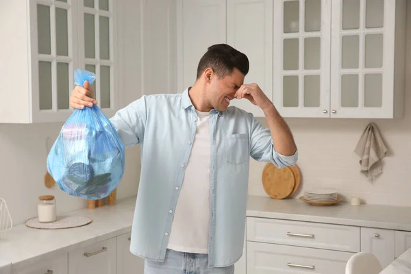 Man Holding Full Garbage Bag Home — Stock Photo, Image