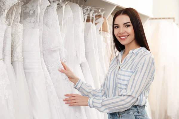 Young Woman Choosing Wedding Dress Salon Stock Picture
