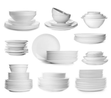 Beyaz arkaplanda farklı temiz bulaşık takımı ile ayarla