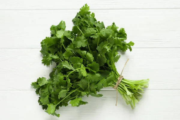 Bunch Fresh Aromatic Cilantro White Wooden Table Top View — Stock Photo, Image
