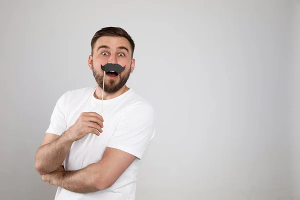 Emotional Man Fake Mustache Light Grey Background Space Text — Stock Photo, Image