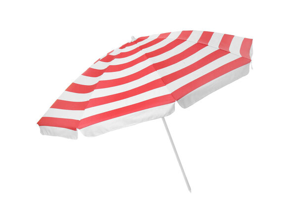 Open red striped beach umbrella isolated on white