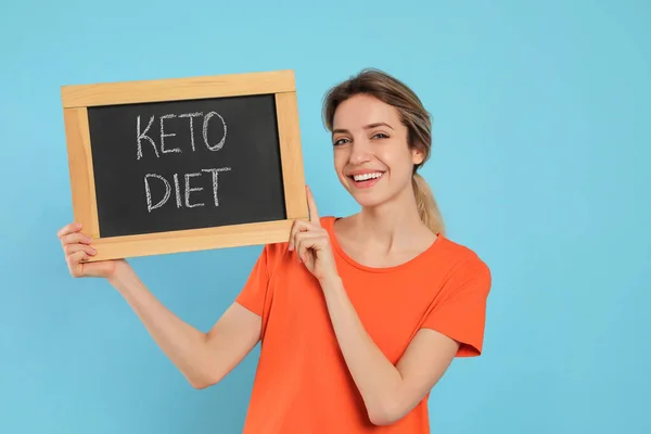Woman Holding Blackboard Phrase Keto Diet Light Blue Background — Stock Photo, Image