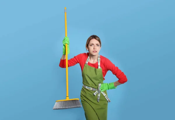 Young Housewife Broom Light Blue Background — Stock Photo, Image