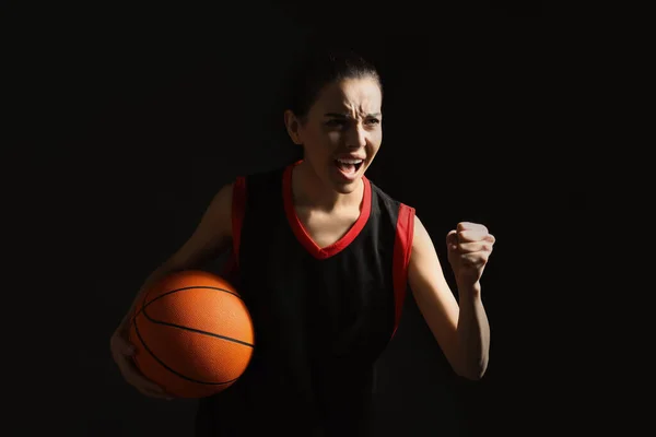 Basketballspieler Mit Ball Auf Schwarzem Hintergrund — Stockfoto