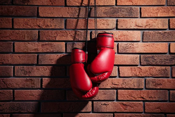 Pair Red Boxing Gloves Hanging Brick Wall — Stock Photo, Image