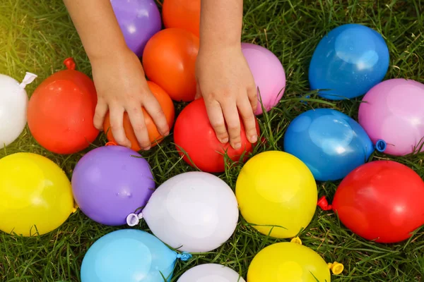 Top View Little Kid Water Bombs Green Grass — Stock Photo, Image