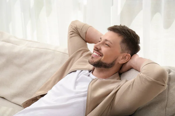 Handsome Man Relaxing Comfortable Sofa Indoors — Photo