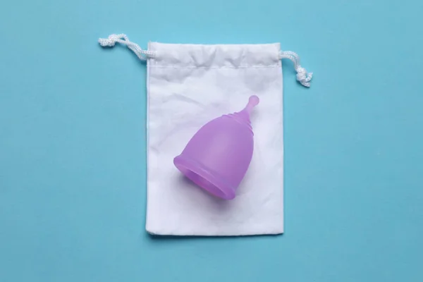 Menstrual Cup Cotton Bag Light Blue Background Top View Reusable — Stock Photo, Image