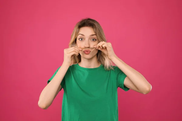 Funny Woman Making Fake Mustache Her Hair Pink Background — Stock Photo, Image