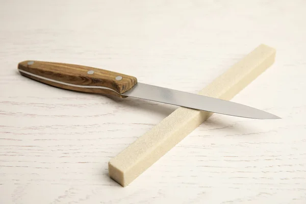 Sharpening Stone Knife White Wooden Table — Stock Photo, Image