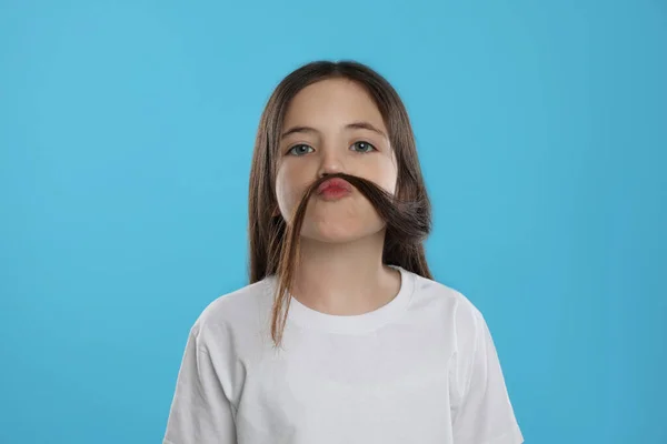 Cute Little Girl Making Fake Mustache Her Hair Turquoise Background — Photo