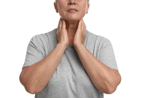 Mature Woman Doing Thyroid Self Examination White Background Closeup — стоковое фото