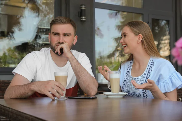 Young Man Having Boring Date Talkative Girl Outdoor Cafe — Stock Photo, Image