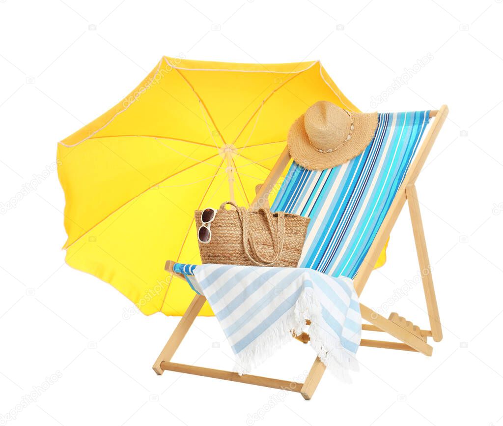 Open yellow beach umbrella, deck chair and accessories on white background