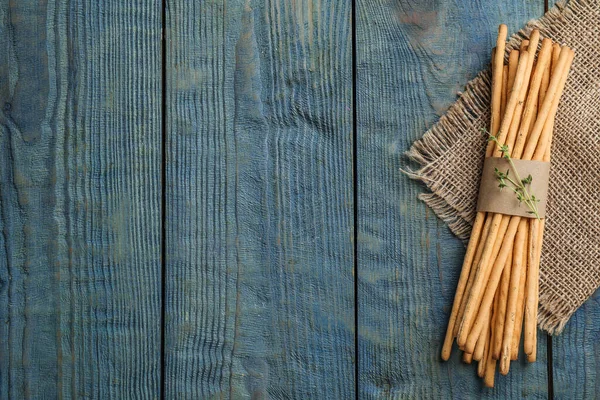 Delicious Grissini Sticks Thyme Wooden Table Top View Space Text — Stock Photo, Image