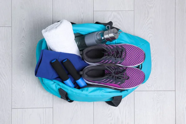 Bag Different Sports Equipment Wooden Floor Top View — Stock Photo, Image