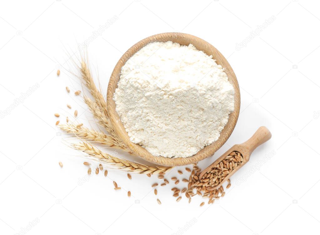 Flour in bowl, spikelets and scoop with grains on white background, top view