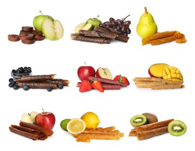 Lezzetli meyve dürümleri ve beyaz arka planda malzemelerle donatılmış. 