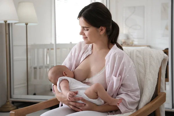 Young Woman Breastfeeding Her Little Baby Home — Stock Photo, Image