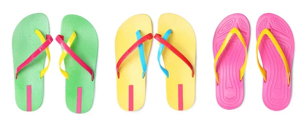 Set Mit Verschiedenen Bunten Flip Flops Auf Weißem Hintergrund Draufsicht — Stockfoto