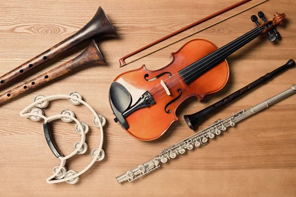 Set Diferentes Instrumentos Musicales Sobre Fondo Madera Plano —  Fotos de Stock