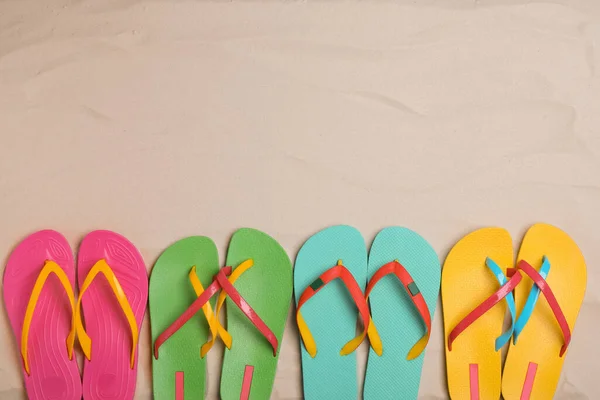 Different Bright Flip Flops Sand Flat Lay Space Text — Stock Photo, Image