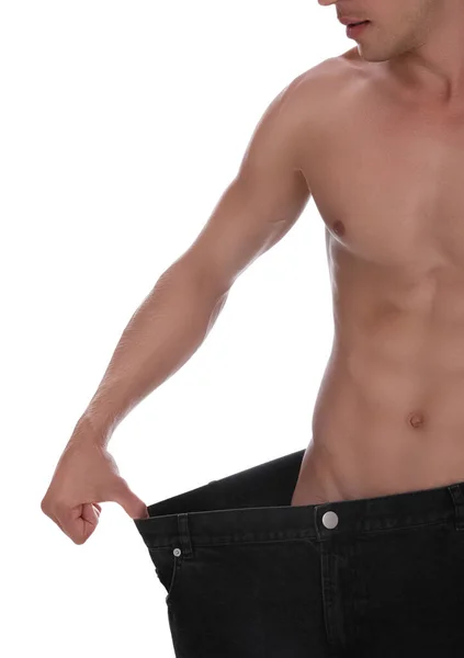 Shirtloser Mann Mit Schlankem Körper Große Jeans Auf Weißem Hintergrund — Stockfoto