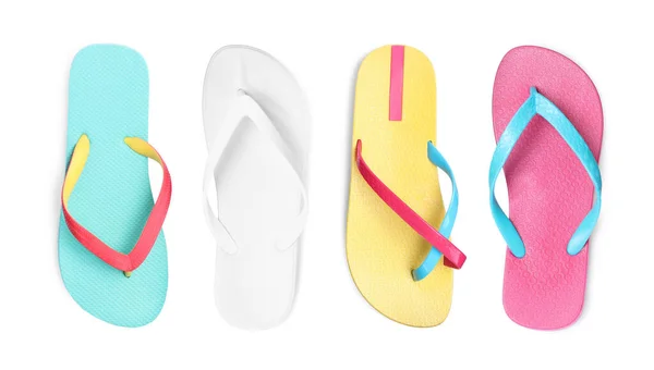 Set Mit Verschiedenen Bunten Flip Flops Auf Weißem Hintergrund Draufsicht — Stockfoto